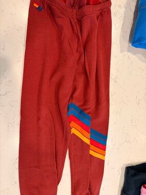 Aviator Nation Maroon Sweatpants with Blue, Red & Yellow Chevron Stripes